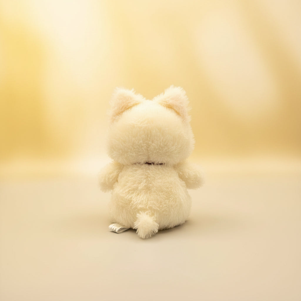 White fluffy toy on a table 